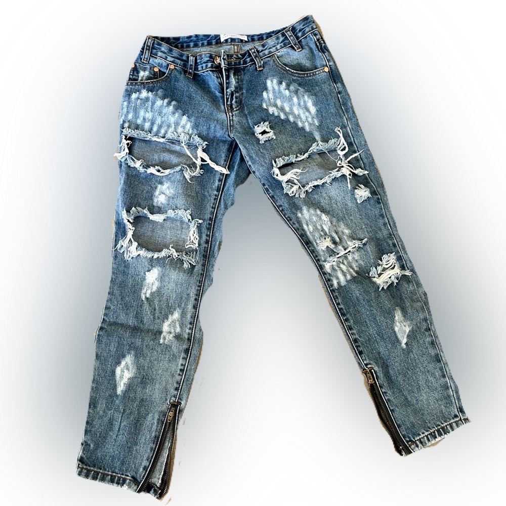 Cool washed out denim jeans with rips and cut outs